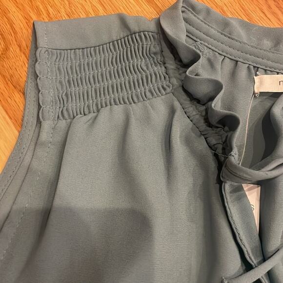 Maurices ruffle trim with peep hole and tie in front sleeveless and semi sheer - Picture 7 of 7